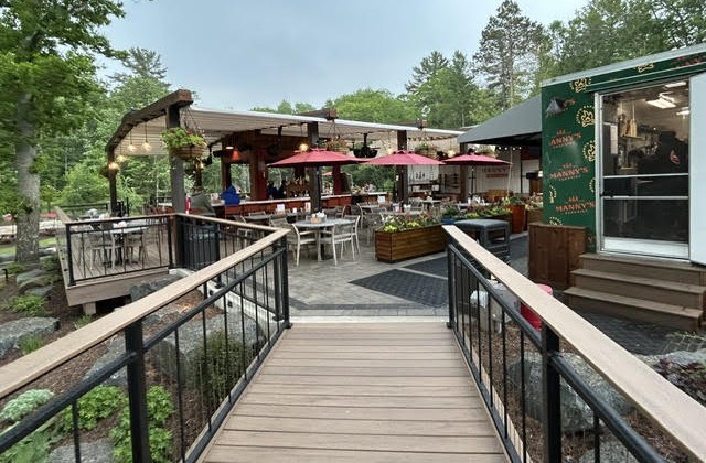 Outdoor patio at Manny's Parkside in downtown Manitowish Waters, a great place to meet up, be entertained and eat